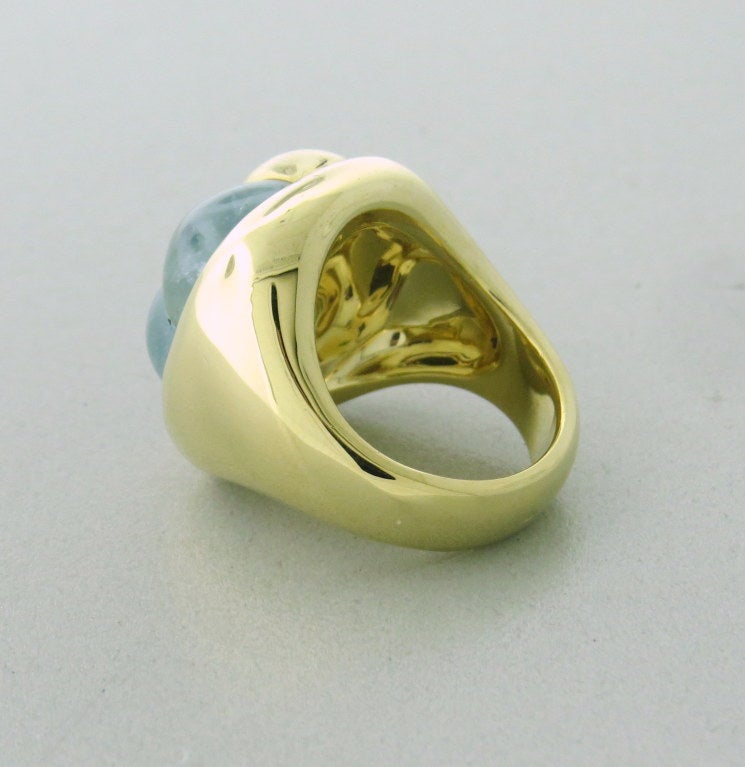 Pomellato 18k gold ring with aquamarine cabochons. Ring size 6, ring top is 20mmx 21mm. Marked Pomellato,750. Weight 28.9g