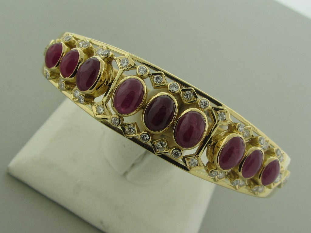 18K yellow gold Marked/Tested 750, GREECE, A21, LALAOUNIS HALLMARK Gemstones/Diamonds Diamonds- approx. 1.22ctw Rubies- approx. 10.80ctw Clarity: VS1-SI1 Color: G-H Measurements: Bracelet comfortably fits up to 7 1/4