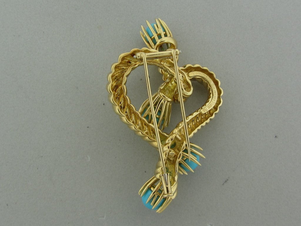 Retail $7000 Metal:18K Yellow Gold Marked/Tested:Tiffany & Co, Schlumberger Studios, 750 Gemstones/Diamonds:TurquoiseClarity: n/a Color: n/a Measurements:Brooch - 60mm x 37mm (1 Inch = 25mm) Weight:30.0g