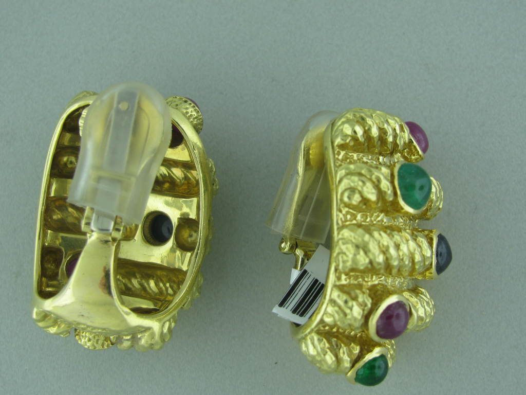 Metal: 18k Yellow Gold Marked/Tested: David Webb, 18k Gemstones/Diamonds: Emerald Cabochons Ruby Cabochons Sapphire Cabochons Clarity: N/A Color: N/A Measurements: Earrings 34mm X 24mm (1 Inch = 25mm) Weight: 49.5g