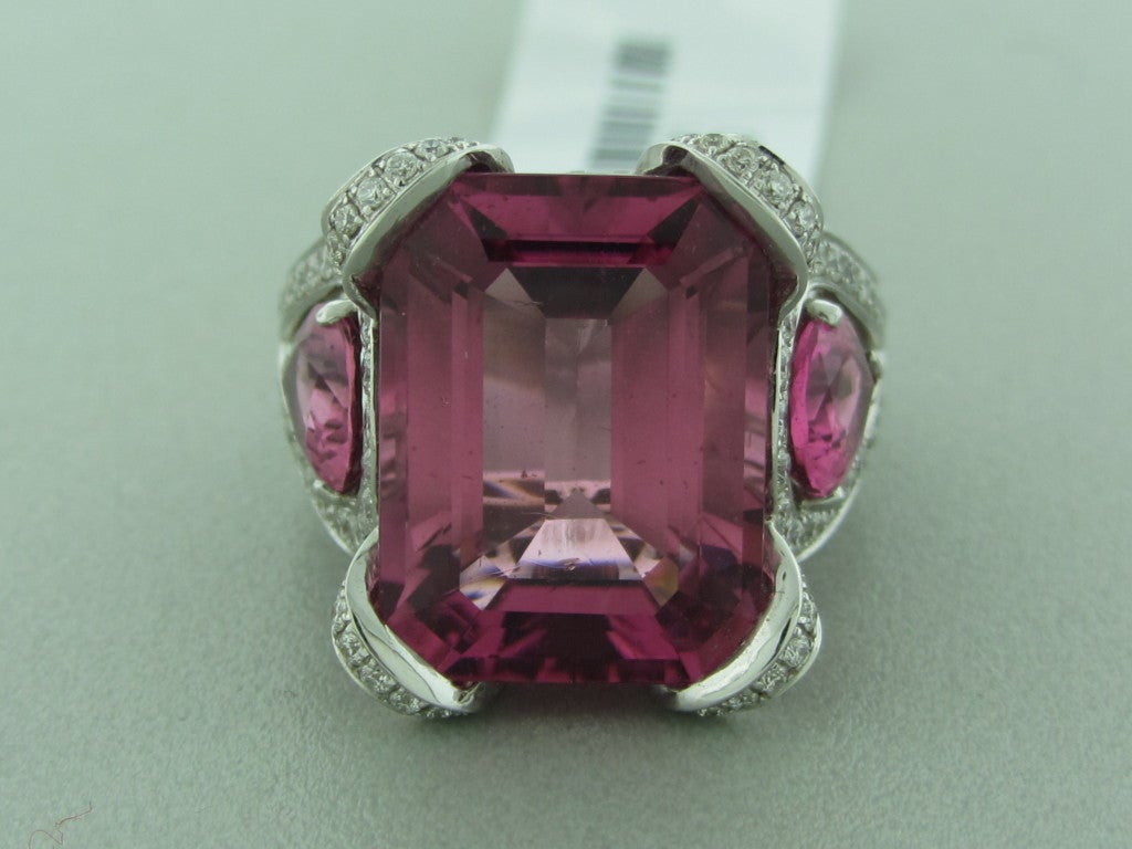 18K White Gold Marked/Tested:Asprey, 750, English Gold Marks Gemstones/Diamonds;:Pink Tourmalines - 13.43ctw Diamonds - 1.44ctw Clarity: VS Color: G Measurements:Ring Size - 7.75, 18.3mm Widest Point (Inch = 25mm) Weight:14.8g