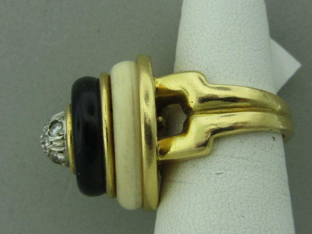 18K yellow gold Marked/Tested TIFFANY & CO, 18K Gemstones/Diamonds Onyx Diamonds- approx, 0.45ctw Clarity: VS Color: G Measurements: Ring size 7, top of ring 21mm in diameter, site 16mm above finger (inch= 25mm) Weight 25.0g