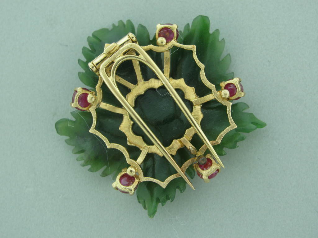Metal: 18K Yellow gold Tested M.BUCCELLATI, ITALY Gemstones/Diamonds 8 Cabochon rubies, nephrite Clarity: Color: Measurements: 36mm X 38/mm ( 1 inch= 25mm) Weight 14.9g