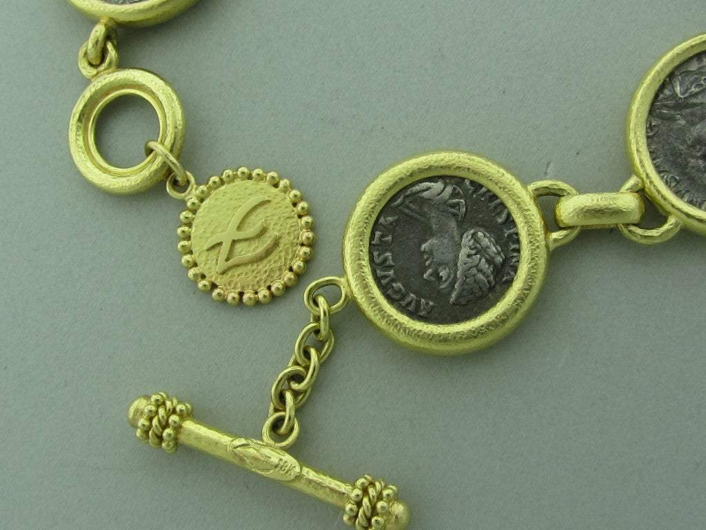 18K Yellow Gold, Marked: Makers Hallmark,18K Gemstones/Diamonds:Ancient Coins Clarity:n/a Color: n/a Measurements:Bracelet Is 9