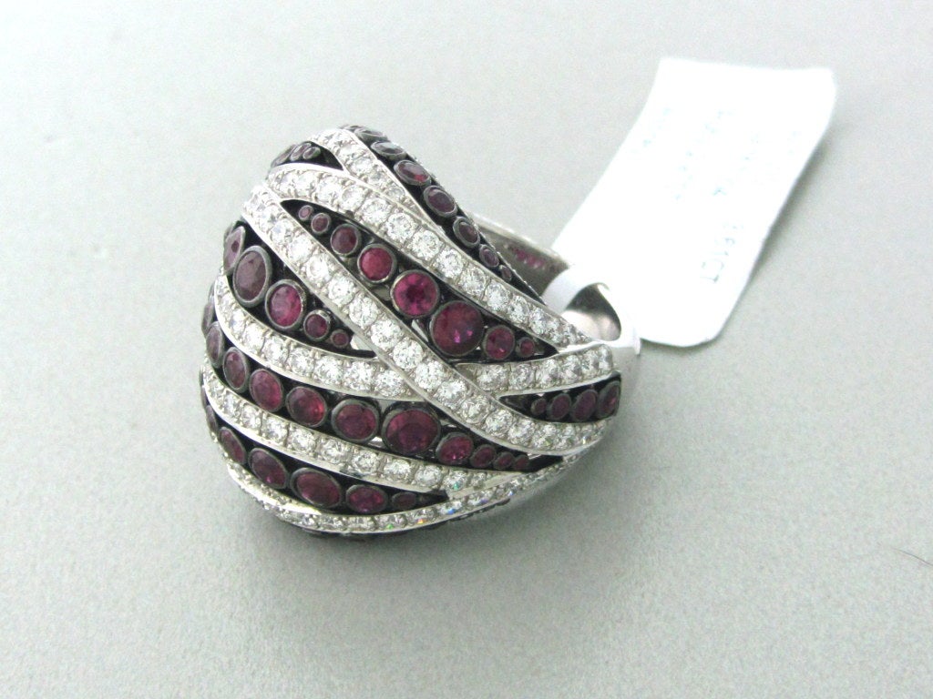 18K White Gold.
 Gemstones/Diamonds:Diamonds - Approx. 3.61ctw Rubies - 2.97ctw Measurements: Ring Size - 6, Ring Top Is 25mm Wide (Inch=25mm) Marked: 750,Asprey. 
Clarity:VS
 Color: G 
Weight:18.4g