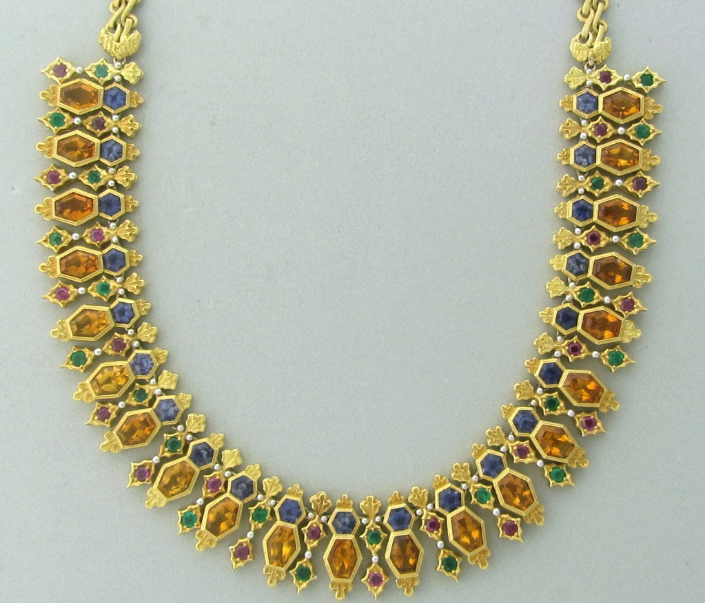 18K YELLOW GOLD
GEMSTONES/DIAMONDS		CITRINES - APPROX. 15.50ctw
EMERALDS - APPROX. 2.00ctw
IOLITE - APPROX. 6.26ctw
RUBIES - APPROX. 2.10ctw
NECKLACE IS 15 1/2
