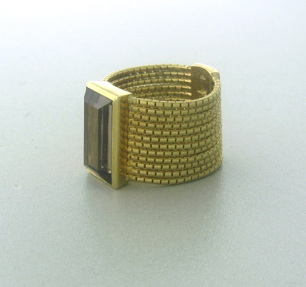 18k Yellow Gold.
 Gemstones:diamonds Smokey Topaz - 7.6mm X 13.8mm.
 Measurements Ring Size - 6 1/2, Ring Is 15.5mm Wide (inch=25mm).
 Marked: H Stern Star Hallmark,750 
Weight: 12.1g