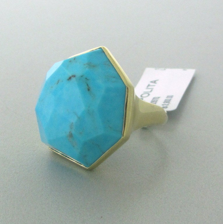 18K Yellow Gold
Turquoise
Ring Size - 7, Ring Top Is 25mm x 21mm  (Inch=25mm)
MARKED:Ippolita,18k

WEIGHT:	18.4g