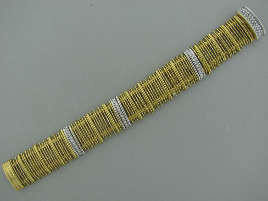 Metal: 18K Yellow Gold Marked/tested Orlandini, 6, 750 Gemstones/diamonds Diamonds - Approx. 0.80 -0.85Ctw Clarity:vs Color:h Measurements: Bracelet 7.5