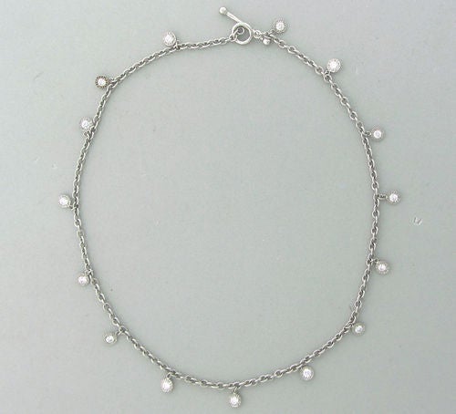 Metal 	Platinum
Gemstones/diamonds 	Diamonds - Approx. 0.65ctw
Measurements 	Necklace 15