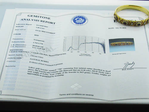 Metal 	18k Yellow Gold
Gemstones/diamonds 	5 Diamonds- 0.15ctw 4 Rubies - 3.48ctw
Measurements 	Bracelet Comfortably Fits Upto 7