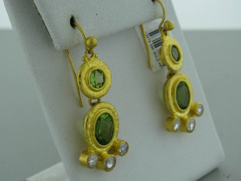 Retail: $13,340 Metal: 24K Yellow Gold Marked/tested Gurhan Hallmarks, Ea00688/0.990 Gemstones/diamonds Diamonds - 1.15Ctw Peridots - 6.75Ctw Clarity: Vs Color: Fancy Color Measurements: Earrings - 41Mm X 16Mm (Inch = 25Mm) Weight 16.3g