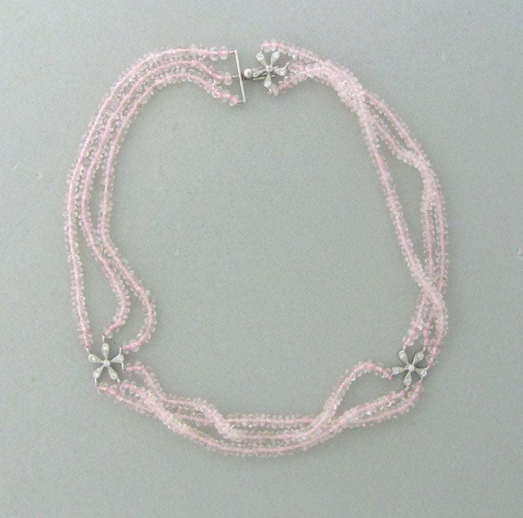 Metal 	Platinum
Gemstones/diamonds 	Diamonds - Approx. 0.20ctw
Rose Quartz Beads
Measurements 	Necklace Is 13