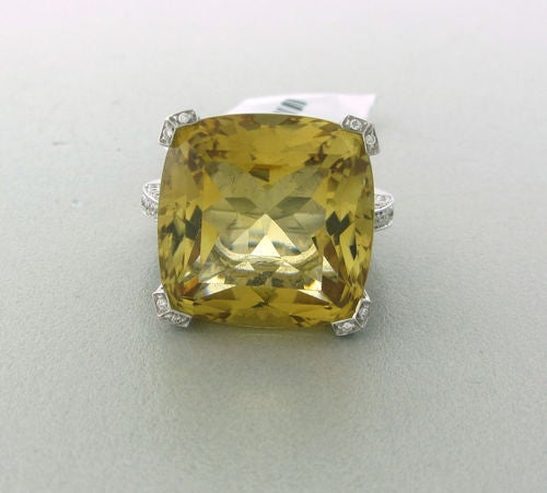 Metal 	18k White Gold
Gemstones/diamonds 	Diamonds - Approx. 0.89ctw
Citrine - 18.2mm X 18.2mm
Measurements 	Ring Size - 6 1/2, Ring Is 18.2mm X 18.2mm (inch=25mm)
Marked/tested 	Asprey,750
Clarity 	Vs
Color 	G
Weight 	15.0g
