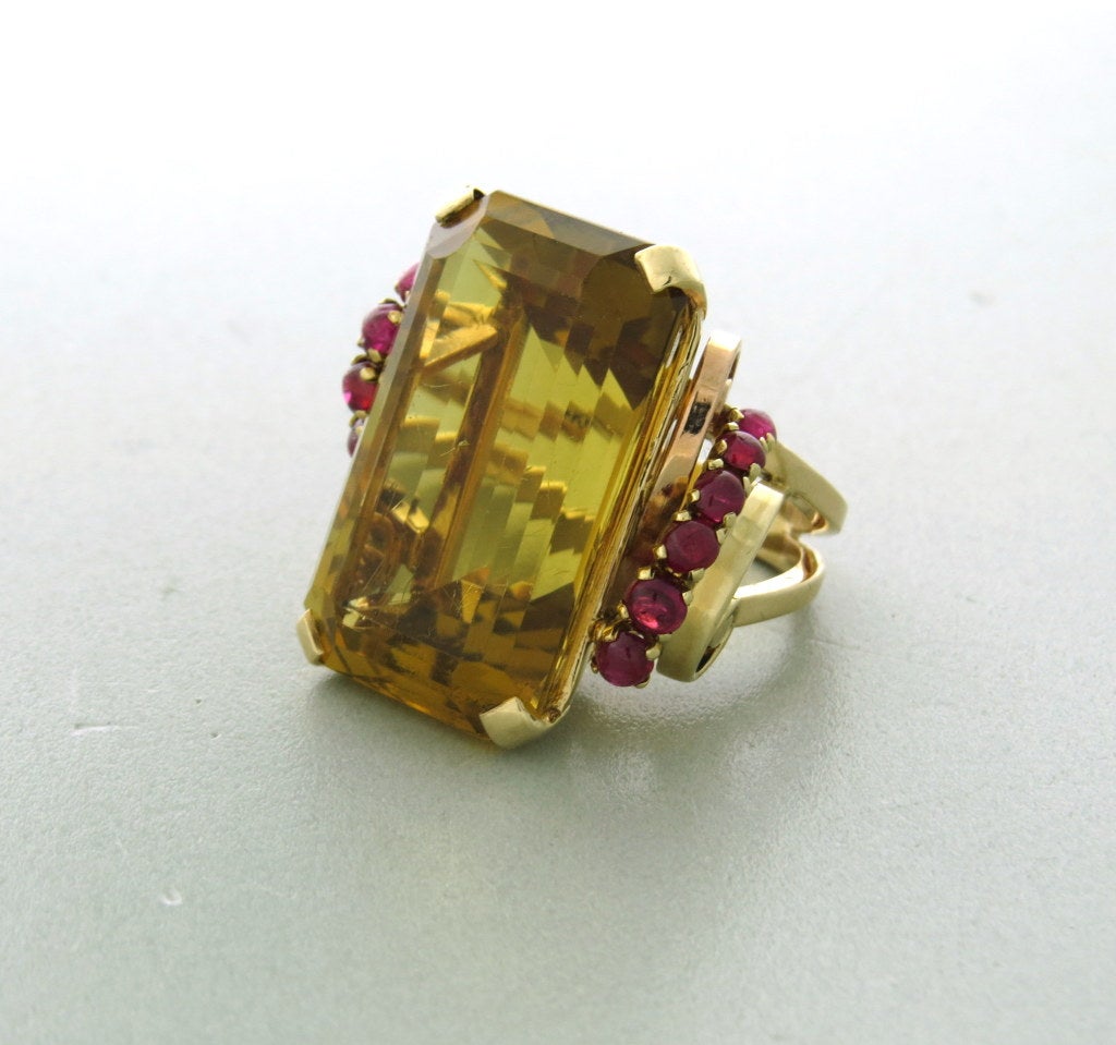 14k Yellow Gold.  Citrine - 23mm x 16mm. Rubies. ring size - 6. Weight - 20.4g.