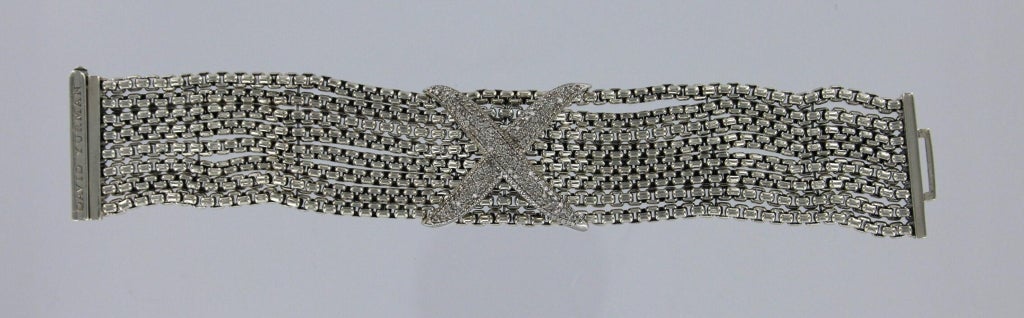DAVID YURMAN Sterling Silver and Diamond Bracelet.  The bracelet has eight linked chains topped with central diamond encrusted X.  The bracelet measures 7 1/8 long and 1.25 inches wide.  The bracelet bears impressed company marks and is in excellent