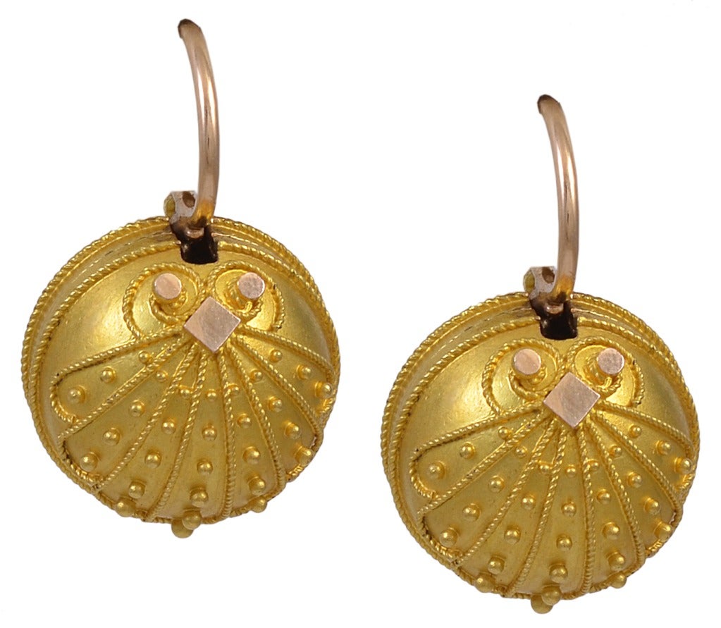 A rare and unusual find, Victorian Coach Earrings with original Diamond studs and coach covers. Each Diamond is 0.75 cts, with a total wieght of 1.50cts. Diamond Earrings with Coach Covers, American circa 188o, These Victorian earrings were featured