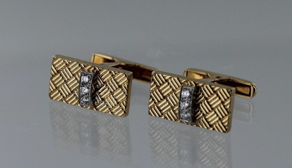 Cartier Yellow Gold and Diamond Cufflink & Stud Set in 14 karat yellow gold with diamonds.  The set has a basketweave design accented with diamonds  The cufflinks measure 3/4