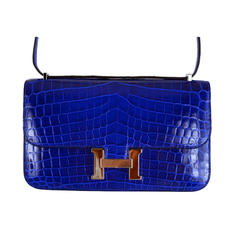 HERMES CONSTANCE ELAN CROCODILE BLUE ELECTRIC PALL HARDWARE WOW!

As always, another one of my fab finds,This is simply a masterpiece. This bag is a statment and truly took my breath away! Hermes new size Constance Elan 25cm made longer than the