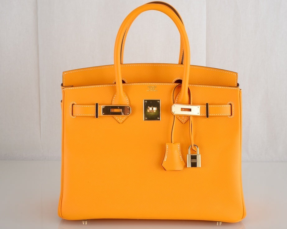 CANDY COLLECTION HERMES BIRKIN BAG JAUNE D'OR PERMABRASS HARDWARE W KELLY WALLET

As always, another one of my fab finds, Hermes 30cm NEW CANDY COLLECTION FOR 2012 JAUNE D'ORE BI COLOR WITH ORANGE INTERIOR BIRKIN EPSOM LEATHER WITH 
PERMABRASS