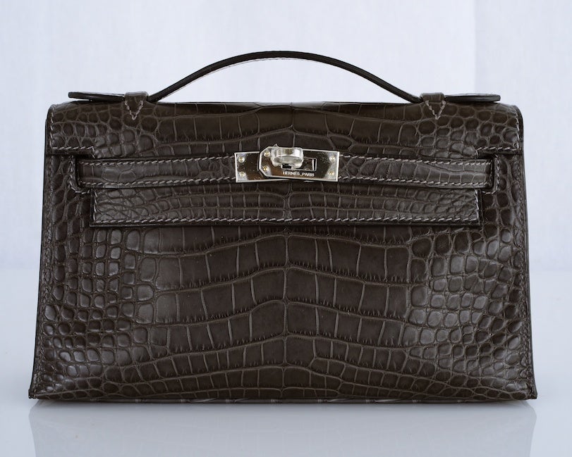 HERMES KELLY BAG JPG POCHETTE GRAPHITE MATTE CROCODILE SUPERFIND

As always, another one of my fab finds,  Hermes Kelly Jpg pouchette in STUNNING MATTE GRAPHITE ALLIGATOR. Perfect companion for anytime you don't want to carry your kelly or a