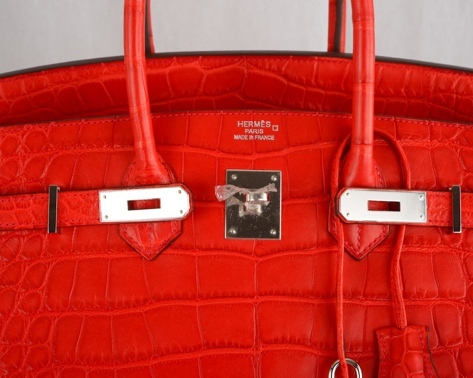 ON FIRE! NEW COLOR HERMES BIRKIN BAG 35cm CROCODILE MATTE RED GERANIUM PHW

HERMES BIRKIN 35CM IN THE MOST BEAUTIFUL SPECIAL NEW BRIGHT RED ALLIGATOR MATTE GERANIUM .THE HARDWARE IS  PALLADIUM.
THIS BAG IS BRAND NEW STAMP P. THE BRIGHTEST OF REDS