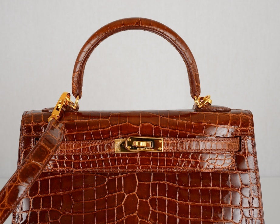 HERMES KELLY CROCODILE BAG 25CM MIEL HONEY GOLD HARDWARE STUNNING!

HERMES KELLY 25CM IN THE MOST BEAUTIFUL AND RARE MIEL HONEY. 
NILO CROCODILE WITH INCREDIBLE GOLD HARDWARE.

HERMES CAPTURED EXACTLY THE RICH HONEY COLOR..LOVE THIS ONE!!  WILL