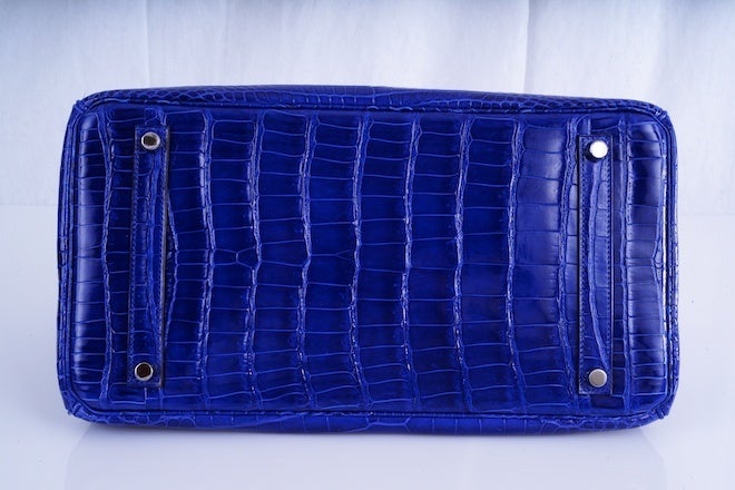 HERMES BIRKIN BAG 35CM BLUE ELECTRIC * BLEU ELECTRIQUE CROCODILE PORO 

As always, another one of my fab finds, the Hermes 35cm Birkin in beautiful color Blue ELECTRIC. One of the most gorgeous colors hermes has ever created. It takes on a