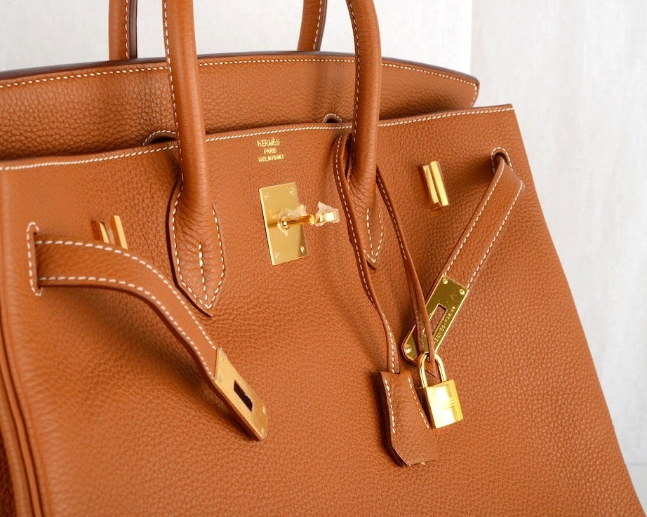 Gorgeous Hermes Birkin Bag Gold Togo 40Cm With Gold Hardware

As Always, Another One Of My Fab Finds, The Bigger The Better! Hermes 40Cm Birkin In Beautiful Classic Gold With B White Contrast Stitching & Gold Hardware  
Togo Leather