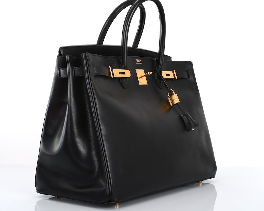 URBAN LEGEND HERMES BIRKIN BAG 40cm BLACK BOX W GOLD HARDWARE 

As always, another one of my fab finds, THE ONE... THE ORIGINAL BIRKIN BAG CREATED FOR JANE BIRKIN!  Hermes 40cm  BLACK box leather WITH GOLD HARDWARE. THIS BAG IS FOREVER. 
THE MORE