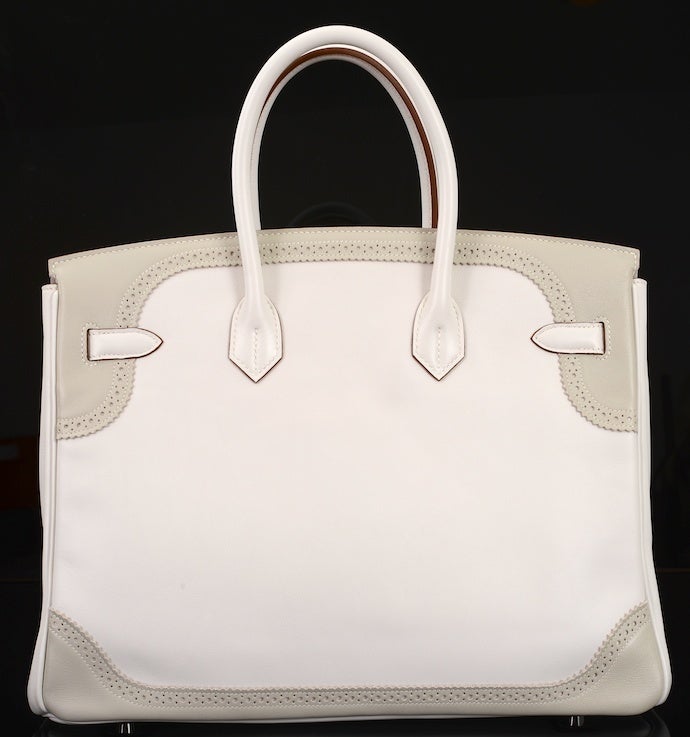 LIMITED EDITION HERMES BIRKIN BAG 35cm GHILLIES WHITE * GRIS PERLE COMBO INSANE!

As always, another one of my fab finds, Hermes 35cm Birkin GHILLIES INSPIRED BY THE SCOTTISH GHILLIE BROGUE SHOES. 

STUNNING BI COLOR COMBINATION WHITE & GRIS