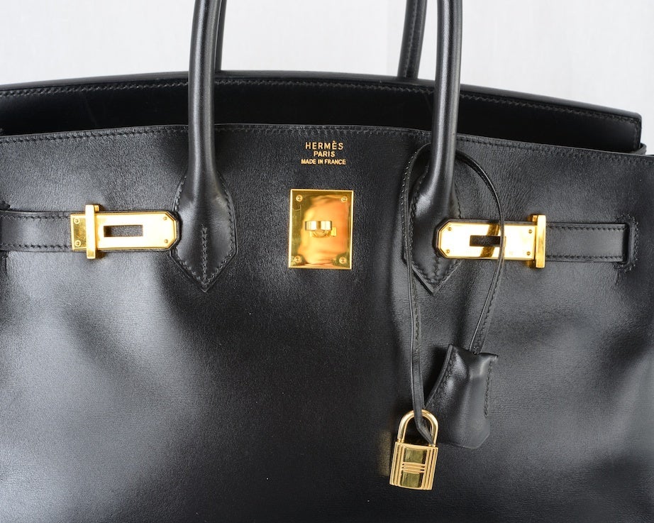 CLASSIC AWESOME FIND! HERMES BIRKIN BAG 35cm BLACK BOX W GOLD HARDWARE 

As always, another one of my fab finds, THE ONE... THE ORIGINAL BIRKIN BAG CREATED FOR JANE BIRKIN!  Hermes 35cm BLACK box leather WITH GOLD HARDWARE. 
THIS BAG IS FOREVER.