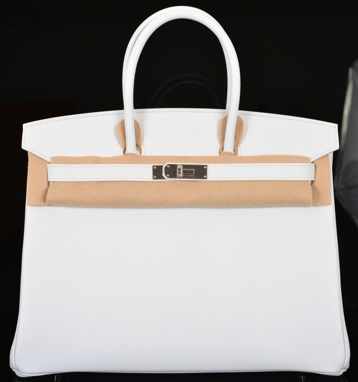 HOT! HERMES BIRKIN BAG 35CM WHITE EPSOM PALLADIUM HARDWARE

As always, another one of my fab finds, Hermes 35cm BIRKIN in beautiful SEXY white EPSOM leather & to die for palladium  hardware. 

THIS BIRKIN IS GORGEOUS THIS COMBINATION IS