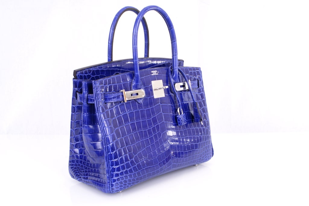 Hermes Birkin Bag 30cm Blue Electric Crocodile Nilo Palladium Hardware. Drop dead gorgeous blue electric, this color will simply take your breath away. Offered excessively to 1stdibs members.