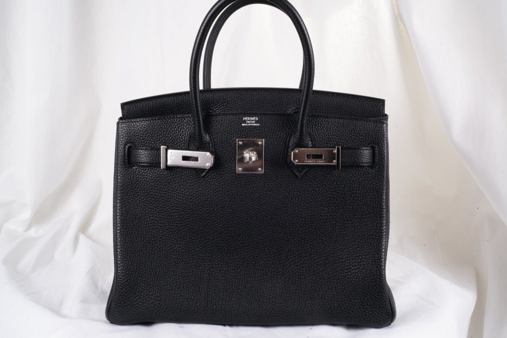 Hermes 30cm Birkin in beautiful RARE BLACK 30CM, TOGO leather with PALLADIUM HARDWARE. This bag comes with lock, keys, clochette, a sleeper for the bag, and rain protector, box