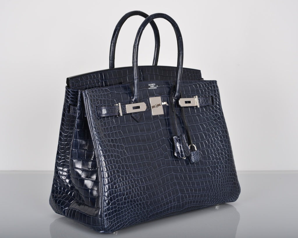 SENSATIONAL! HERMES BIRKIN BAG 35CM BLUE ABYSSE CROCODILE PALLADIUM HARDWARE

As always, another one of my fab finds, the Hermes 35cm Birkin in beautiful color Blue Abysse. One of the most gorgeous colors hermes has ever created. The color is a
