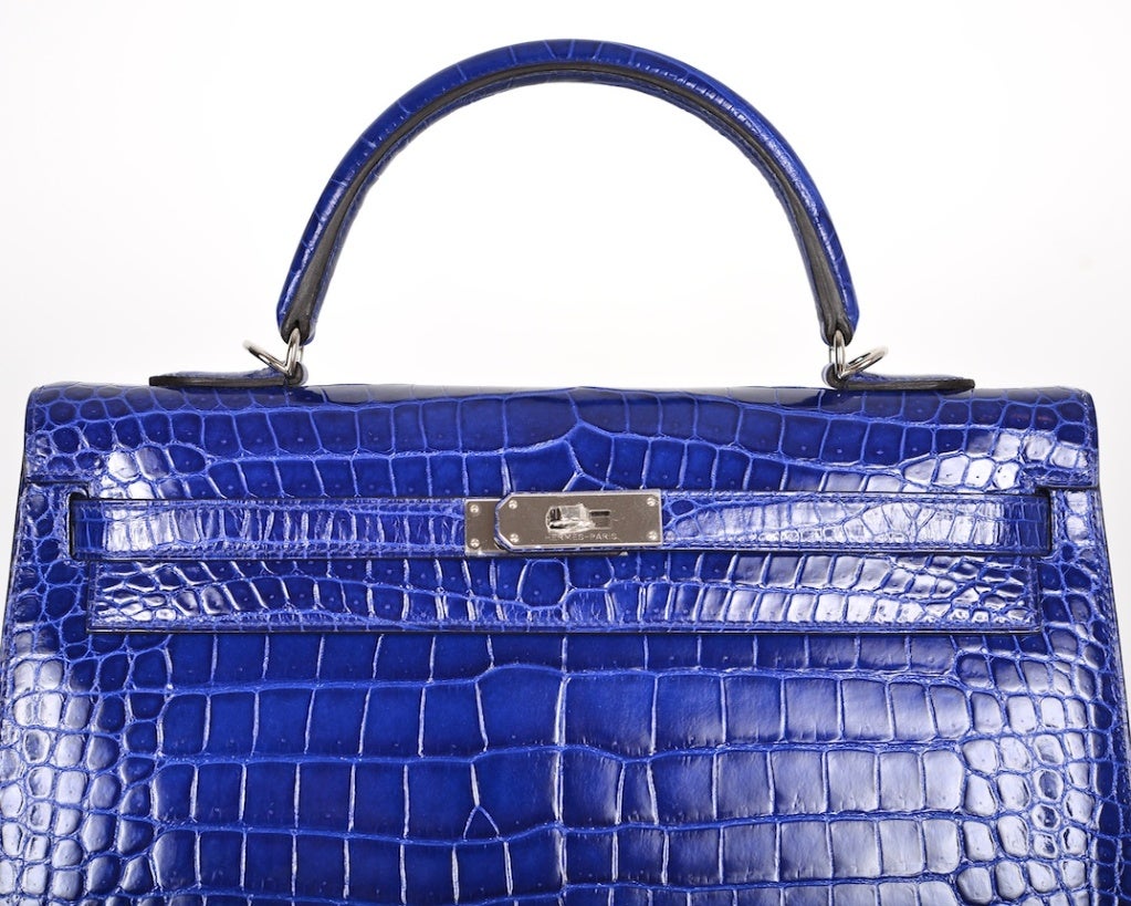 HERMES KELLY BAG 35CM BLUE ELECTRIC * BLEU ELECTRIQUE CROCODILE POROSUS

As always, another one of my fab finds, the Hermes 35cm KELLY in beautiful color Blue ELECTRIC. One of the most gorgeous colors hermes has ever created. It takes on a