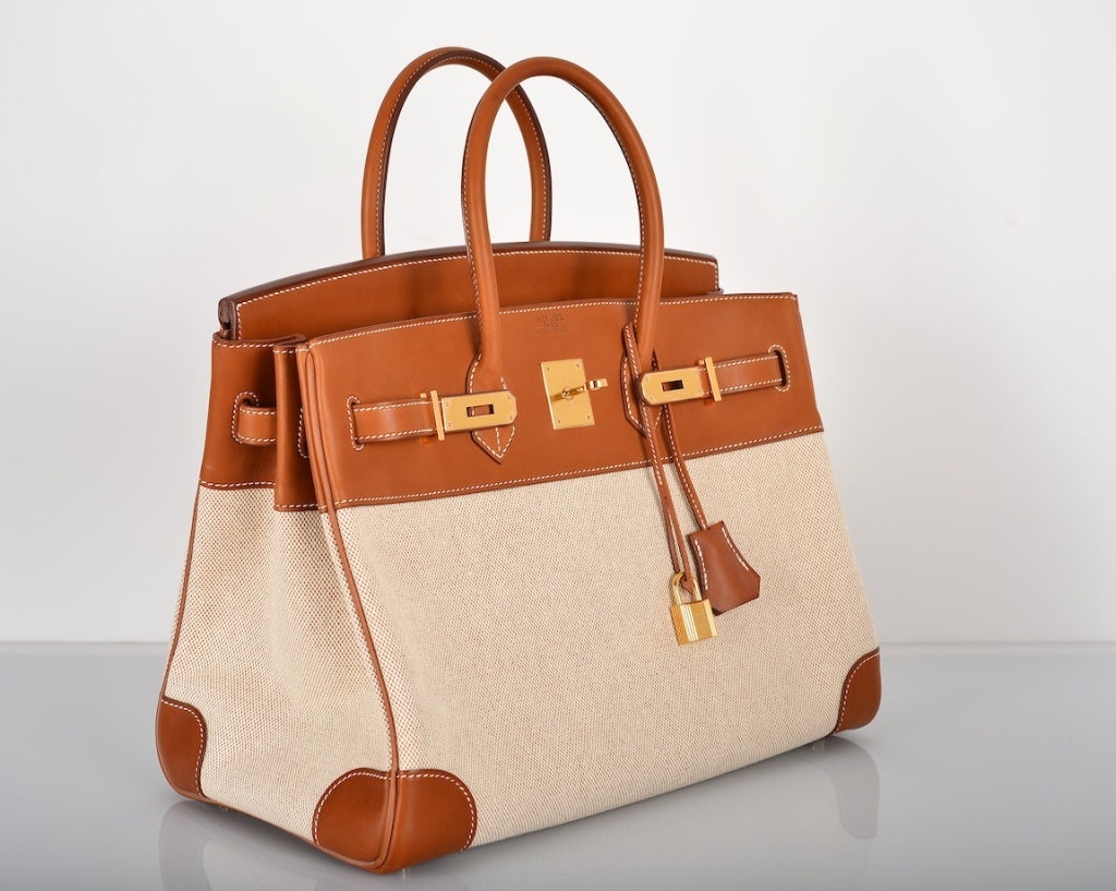 HERMES BIRKIN BAG 35 CM 2 TONE BARENIA WITH TOILE INSANE GHW

As always, another one of my fab finds, the Hermes 35cm Birkin Bag in beautiful BARENIA TOILE 2 TONE COMBINATION with incredible gold hardwear 

This bag comes with lock, keys,