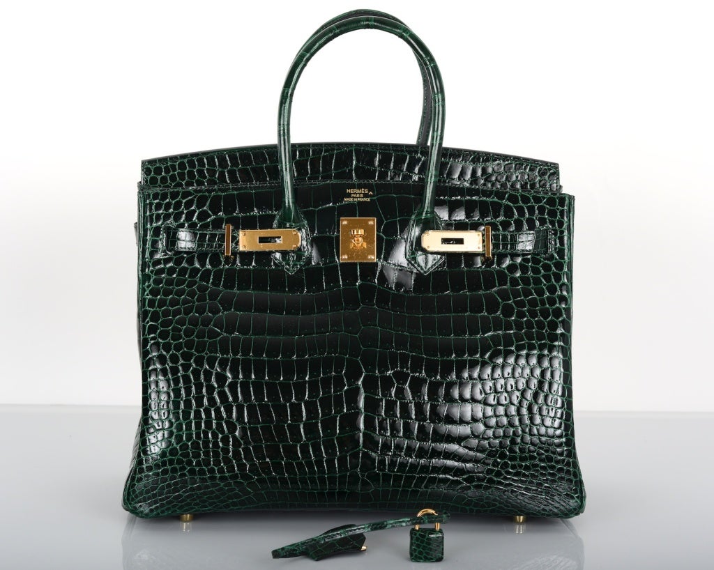 EPIC... HERMES BIRKIN BAG 35CM VERT FONCE CROCODILE POROSUS GOLD HARDWARE

THIS IS A VERY SPECIAL COLOR AND COMBINATION.
THIS BAG IS ABSOLUTELY BRAND NEW TAKEN OUT OF THE BOX ONLY FOR PHOTOS.

HERMES BIRKIN 35CM IN THE MOST MAGICAL GREEN VERT