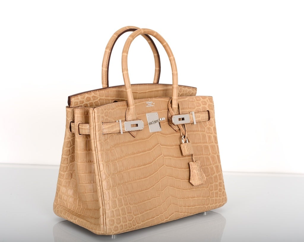 HERMES BIRKIN BAG 30cm POUSSIERE MATTE NILO CROCODILE MY FAVE 

As always, another one of my fab finds, The sexiest bag ever? Hermes 30cm Birkin in beautiful MATTE POUSSIERE NILOTICUS CROCODILE with stunning palladium hardware  

This bag comes