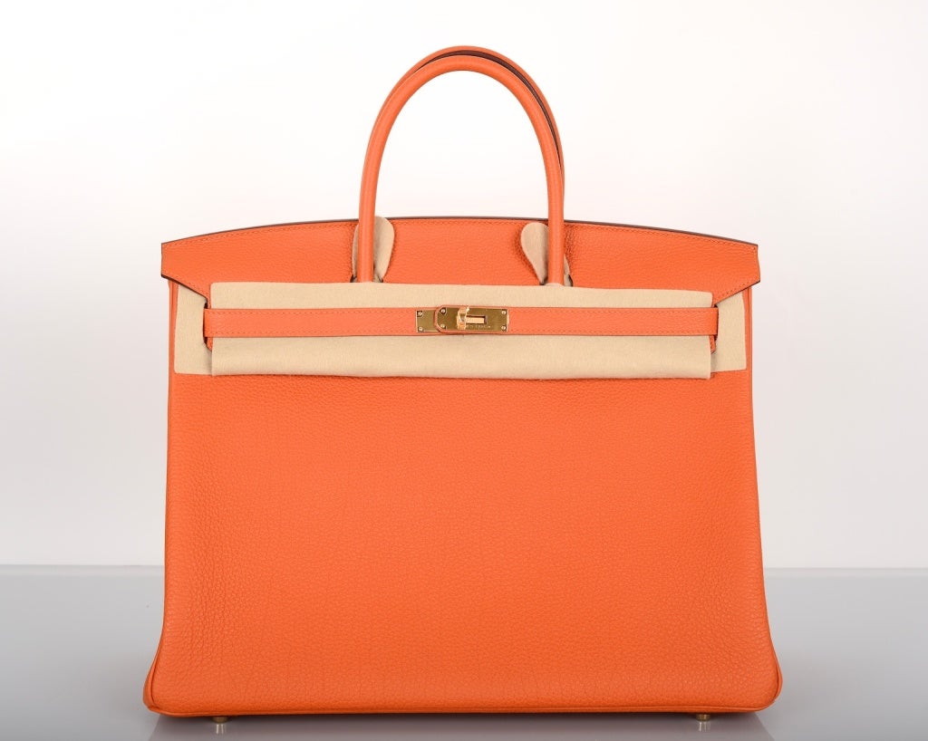 STUNNING! HERMES BIRKIN BAG 40CM HOT ORANGE 40CM GHW! MUST HAVE!!

As always, another one of my fab finds, NEW INCREDIBLE Hermes BIRKIN BAG 40cm ORANGE WITH GOLD Hardware in beautiful TOGO leather.

This bag is brand new with original box and