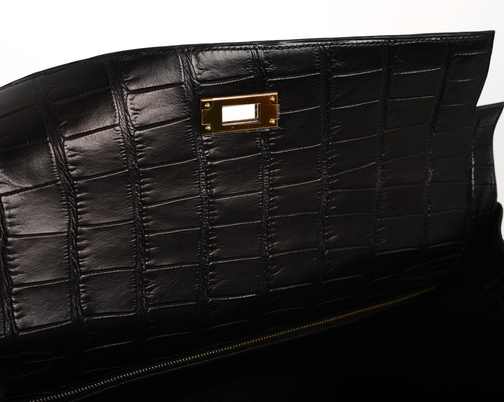 SUPERFIND JF FAVE! HERMES KELLY BAG 32CM MATTE CROC BLACK WITH GOLD HARDWARE

As always, another one of my fab finds,  Hermes 32cm MATTE BLACK ALLIGATOR KELLY WITH INCREDIBLE GOLD HARDWARE !  FIRST TIME IN 20 YEARS I HAVE A KELLY  IN THIS RARE