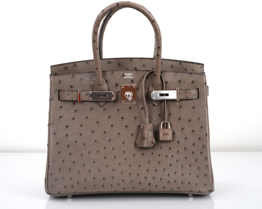 STUNNING!

AS ALWAYS ANOTHER ONE OF MY FAB FINDS! HERMES STUNNING SPECIAL COLOR DOVE GREY / GRIS TOURTERELLE IN OSTRICH LEATHER BIRKIN WITH PALLADIUM HARDWARE! 

- THE MOST AMAZING  GRAY OSTRICH COLOR WITH PALLADIUM HARDWARE SEXIEST BAG EVER!
-