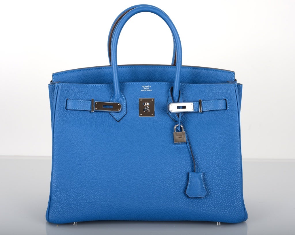 As always, another one of my fab finds, IMPOSSIBLE COLOR TO FIND! Hermes 35cm BIRKIN BAG MYKONOS in beautiful TOGO leather with palledium hardware.

This bag is in absolute pristine condition the hardware is untouched but the plastic was taken
