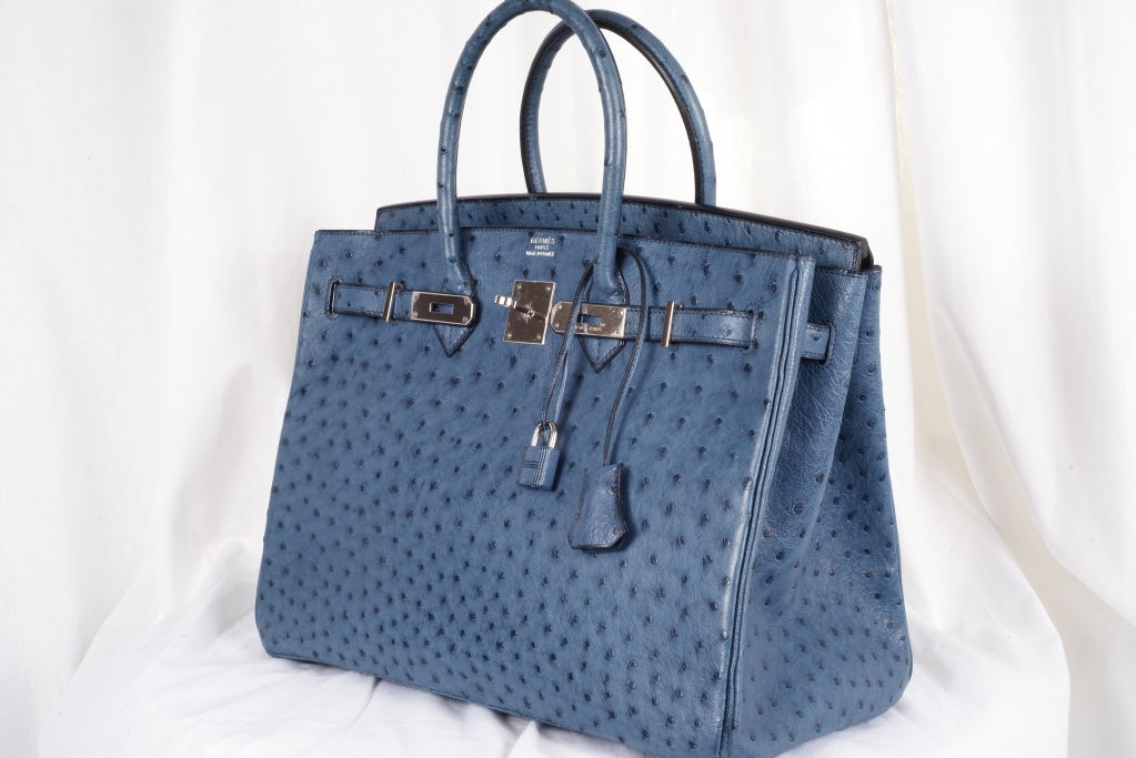 Hermes Birkin Bag 35cm Collectors Blue Roi Ostrich Palladium Hardware. Older stamp, plastic on hardware, pristine condition. Offered exclusively to 1stdibs members. The 35cm Ostrich is no longer available directly from Hermes, a true collector piece.