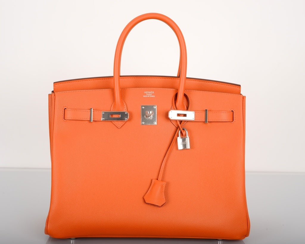 As always, another one of my fab finds, Hermes 35cm NEW CANDY COLLECTION FOR 2012 MANGUE GORGEOUS SORBET ORANGE COLOR BIRKIN EPSOM LEATHER WITH 
PALLADIUM HARDWARE!

THIS BAG WILL TAKE YOUR BREATH AWAY TRULY A MASTER PIECE!!

This bag comes