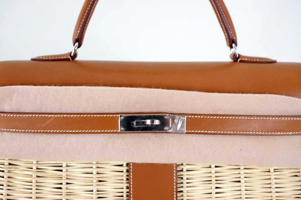 As always, another one of my fab finds,  Hermes  PICNIC KELLY 35cm gorgeous LIMITED PRODUCTION PICNIC KELLY. Insane Barania and wicker WITH INCREDIBLE Palladium HARDWARE!
THIS BAG WILL TAKE YOUR BREATH AWAY A UNIQUE MASTERPIECE!

If there is any