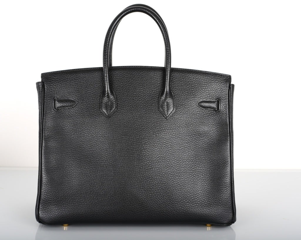 SUPERFIND HERMES 35CM BIRKIN BAG BLACK WITH GOLD HARDWARE ARDENNE LEATHER

As always, another one of my fab finds, Hermes 35cm BIRKIN BAG in beautiful BLACK WITH GOLD hardware SUPER RARE ARDENNE LEATHER with SO HARD TO FIND GOLD HARDWARE! CLASSIC