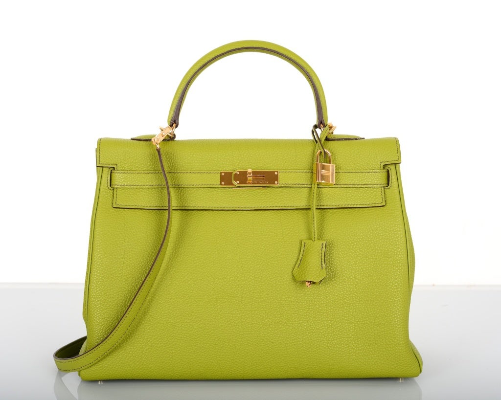 As always, another one of my fab finds, Hermes 35CM VERT ANIS KELLY WITH INCREDIBLE GOLD HARDWARE!

THIS COLOR WILL TAKE YOUR BREATH AWAY TRULY A MASTER PIECE!

This bag comes with lock, keys, clochette, a sleeper for the bag, and rain protector