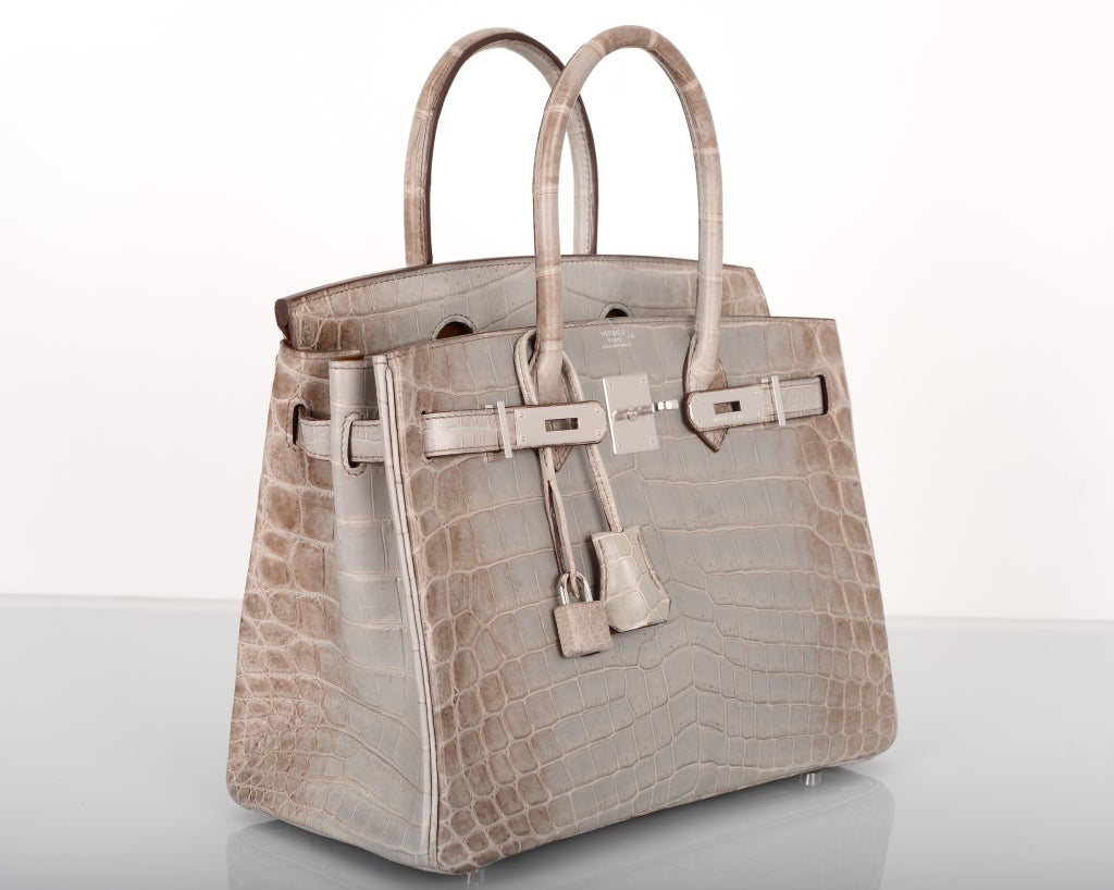 WOWZA! HERMES BIRKIN BAG 30cm HIMALAYAN GREY CROCODILE TREAT YOURSELF!!

AS ALWAYS, ANOTHER ONE OF MY INSANE HERMES FINDS! 

Not your ordinary croc BIRKIN, this is very special and only offered to ?elite? clientele. Grey